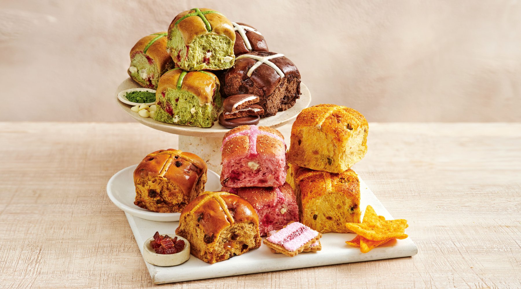 Meet the flavour packed hot cross bun class of 2026, Coles Easter Doritos® Inspired Cheesy Jalapeno Hot Cross Buns , Coles Easter Arnott’s Mint Slice™ Inspired Hot Cross Buns , Coles Easter Sticky Date Inspired Hot Cross Buns , Coles Easter Matcha and Raspberry Inspired Hot Cross Buns 