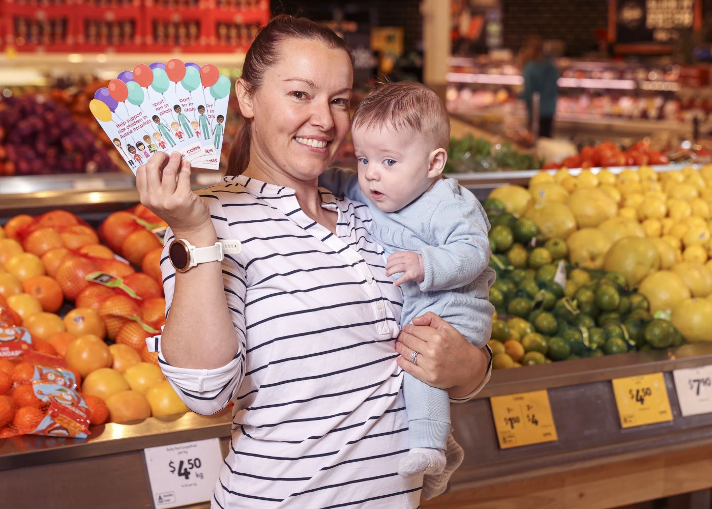 The Coles Curing Homesickness campaign will help more babies like Jye who was born prematurely to undertake stem cell therapy.  (Pictured with mother Nicky and $2 donation cards)