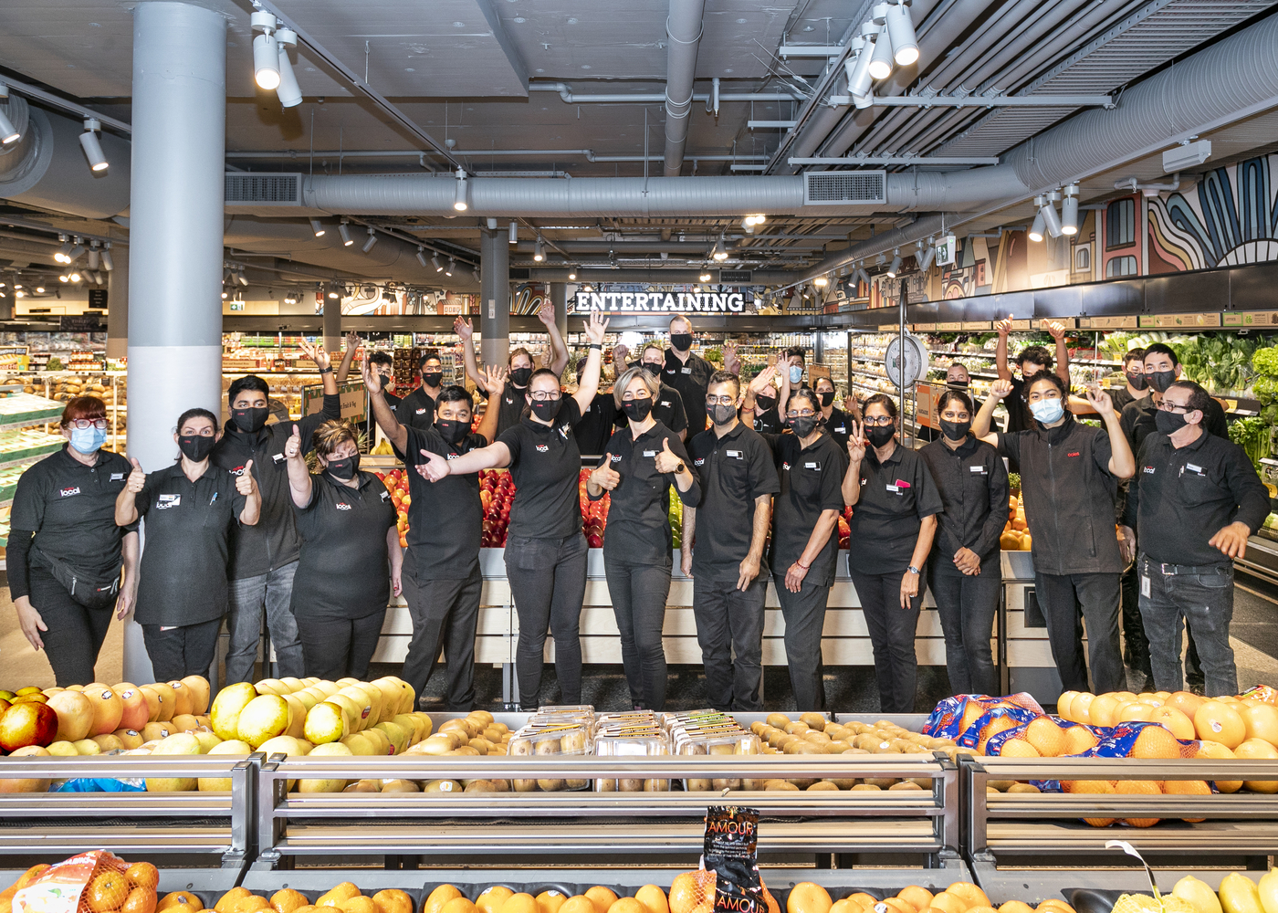 Coles Local Concord team members celebrate the store opening