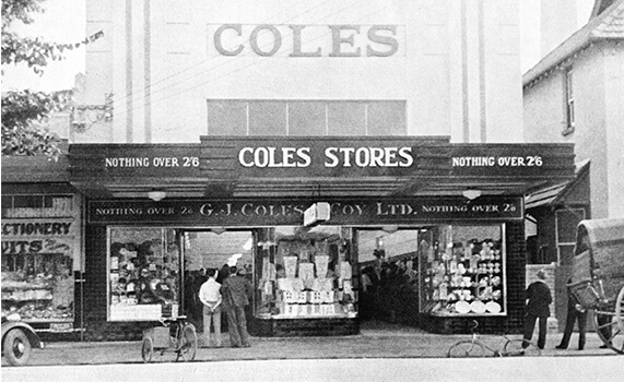 1930 - 1939 -  Two people standing infront of Coles store