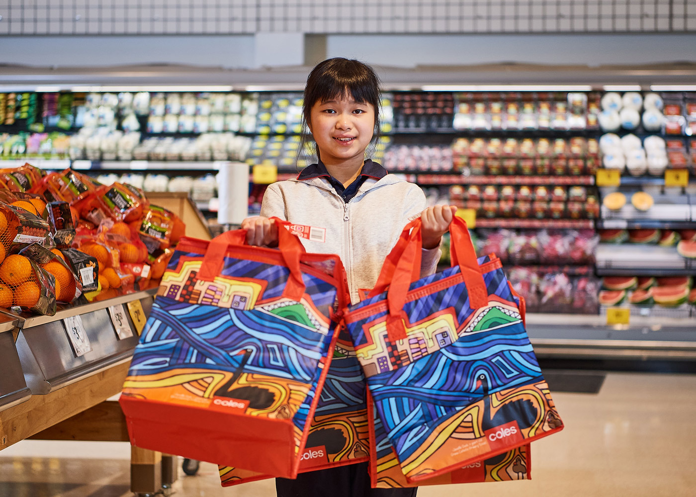 12-year-old Janelle with her bag design