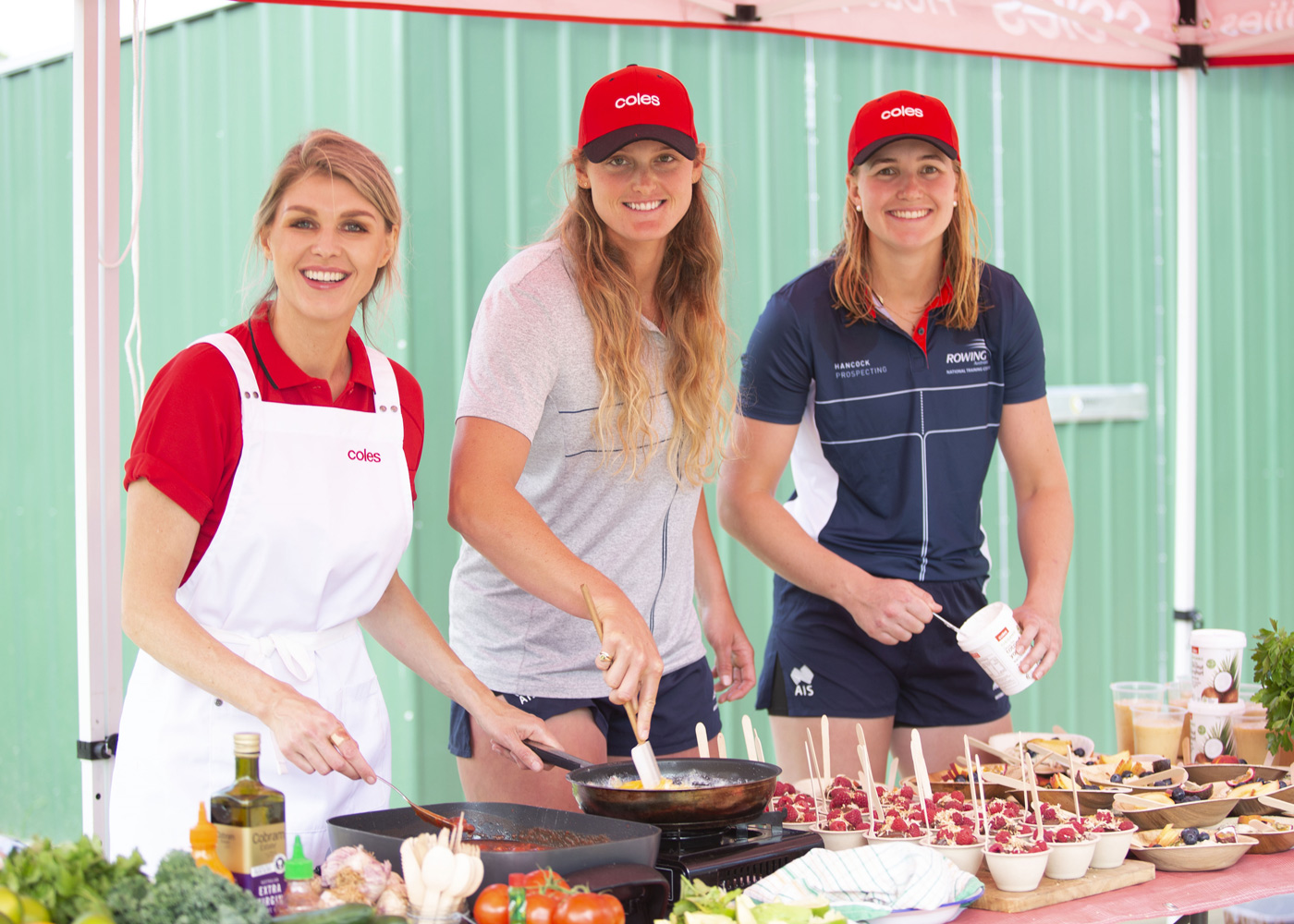 Coles Ambassador and Masterchef Courtney Roulston gives Australian rowers Georgie Rowe and Harriet Hudson some tips