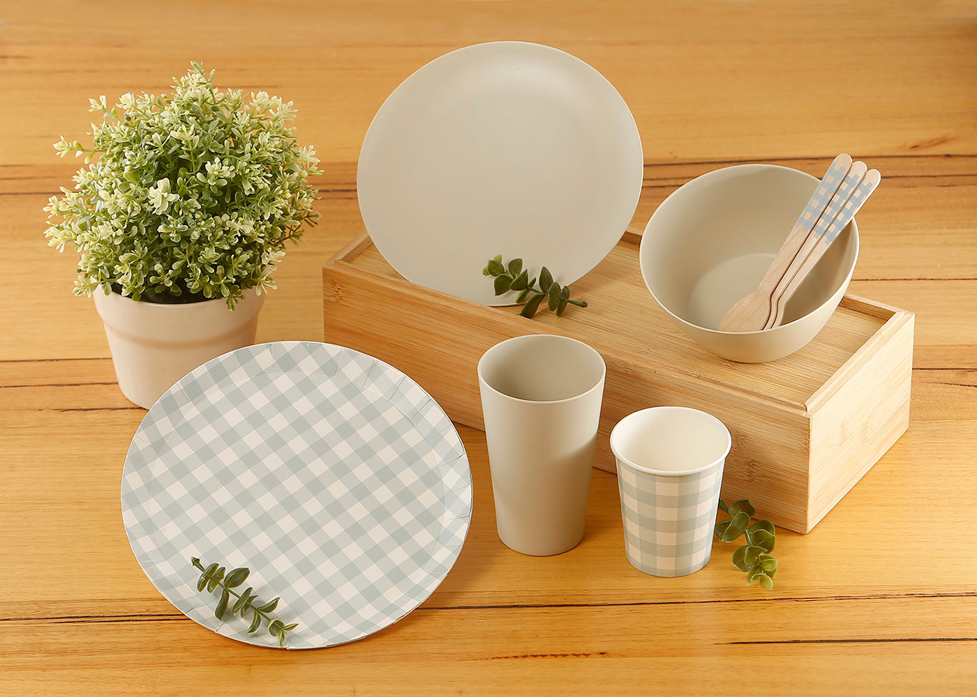 Some of Coles' new reusable and single-use tableware range