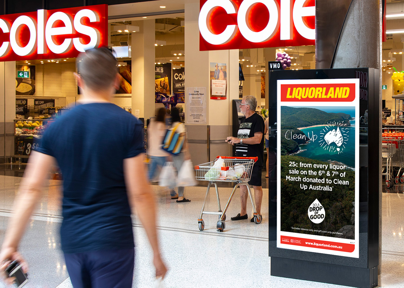 Clean Up Australia advertisement in front of Coles supermarket 