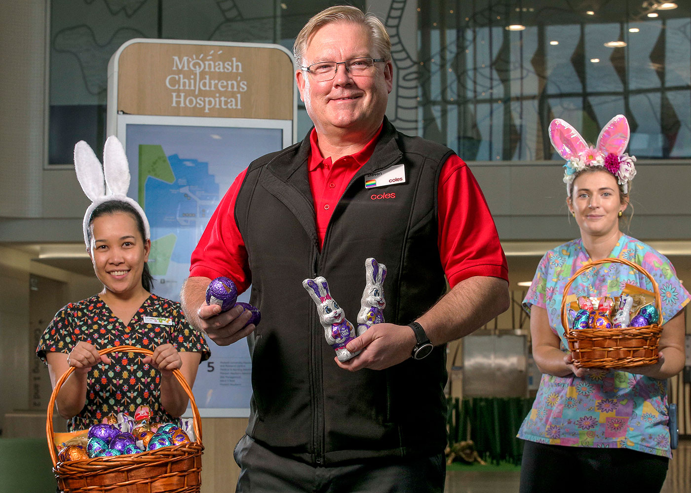 Nurse Emy, Coles Group CEO Steven Cain, nurse Erin at Monash Children's Hospital with Coles eggs