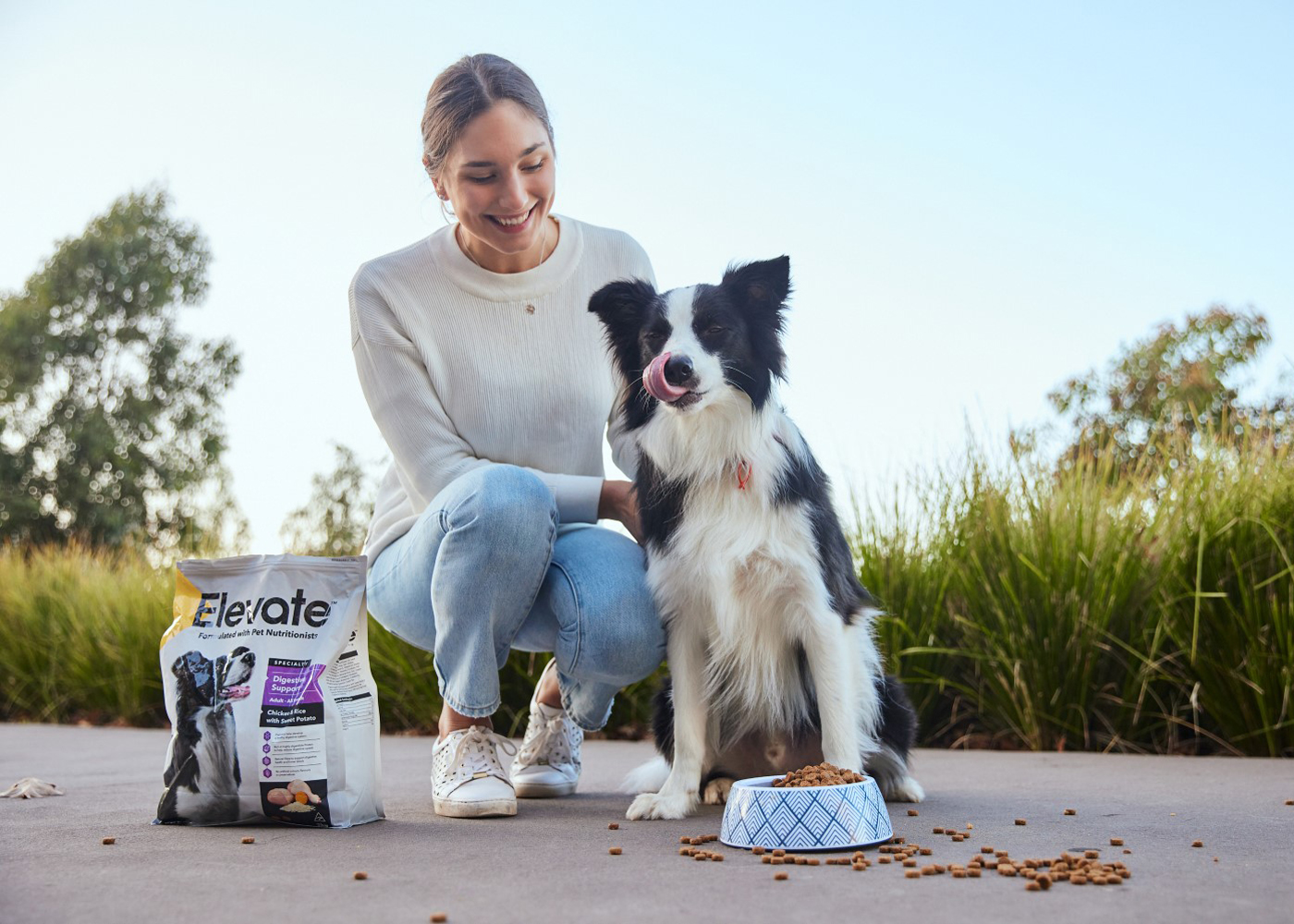 Laura Zolis with Teddy enjoying Elevate Digestive Support