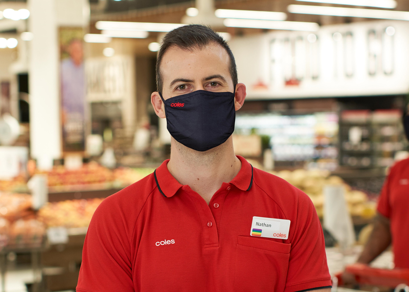 Coles Team Member wearing a mask 