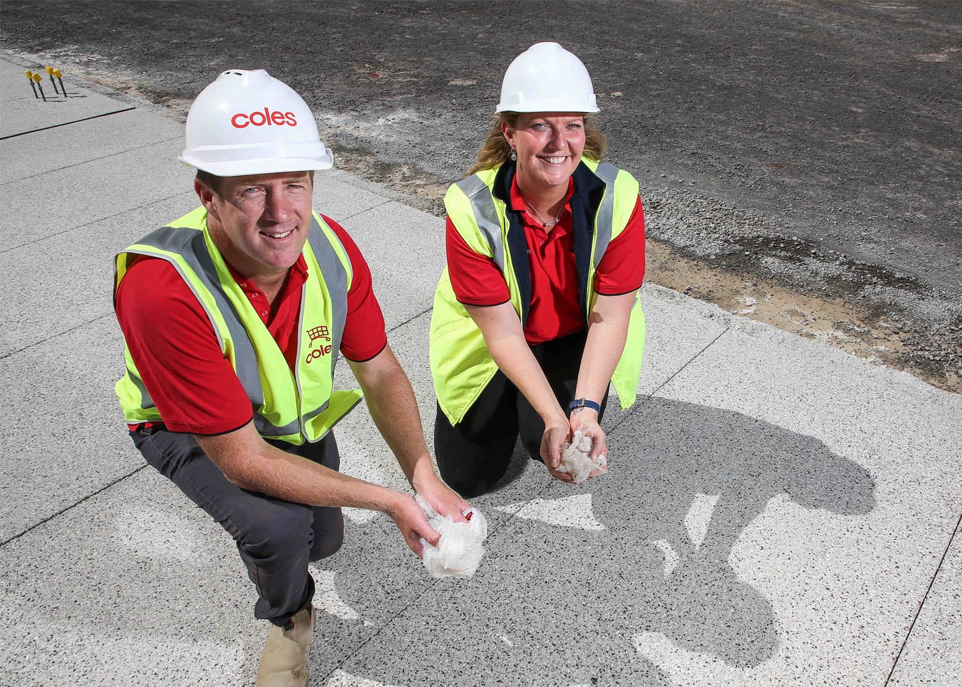 Coles Senior Project Manager Luke Hill with Coles State Construction Manager Victoria Fiona Lloyd at Coles Cobblebank with polyrock