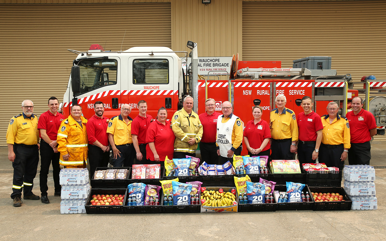 Wauchope firefighters with Coles team members