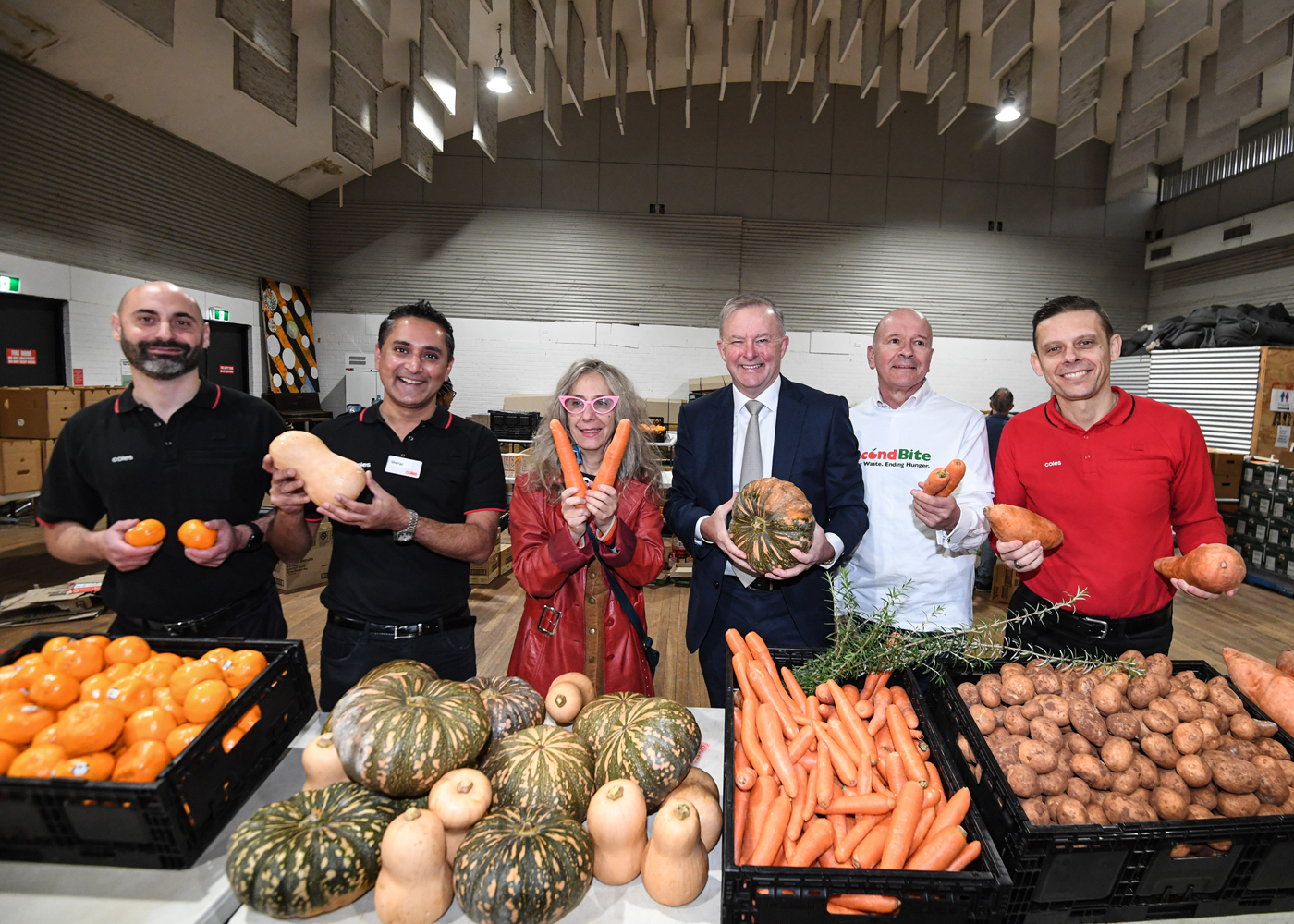 L-R: Chris Cauchi, Coles Marrickville, Store Manager, Sheraz Rasool, Coles Regional Manager NSW, Rosanna Barbero, CEO of Addison Road Community Centre Organisation, Anthony Albanese, Member for Grayndler NSW and Leader of the Opposition, Julian Martin, SecondBite Chairman and Ivan Slunjski, Coles State General Manager NSW